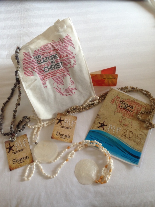 Tote bags, necklaces, name tags and program for the 2015 AMF