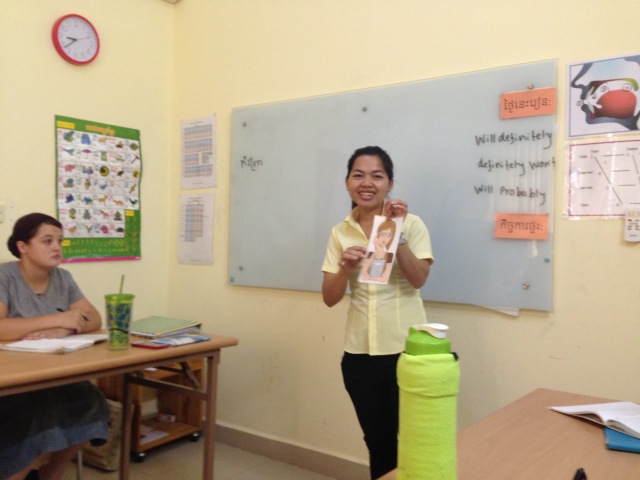 Sharon's new Khmer teacher, Sompoa giving instruction in the classroom